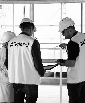 Raland team reviewing plans